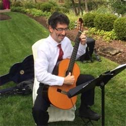 Playing classical guitar at a wedding